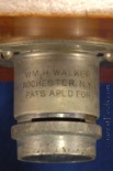 Waterhouse slot to insert disc with three different stops on Achromatic lens of William Walker first portable camera patented in 1882